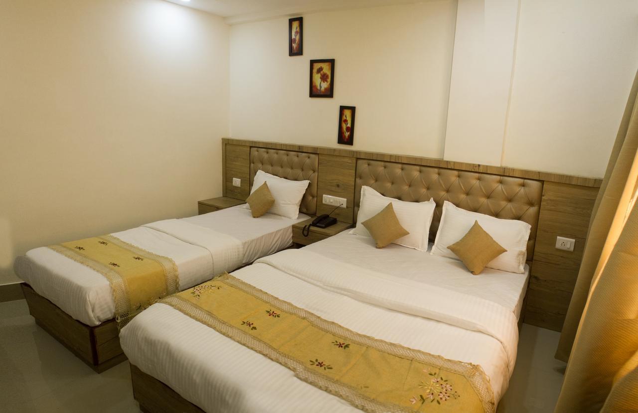 Nexstay Crystal Residency Kozhikode Buitenkant foto